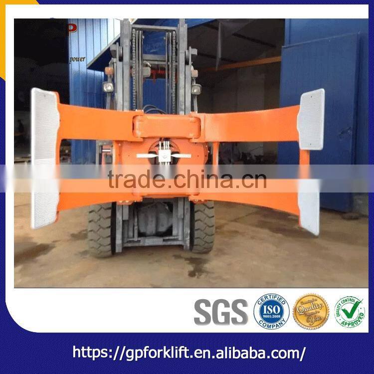 Rapidly rotating forklift paper roll clamp