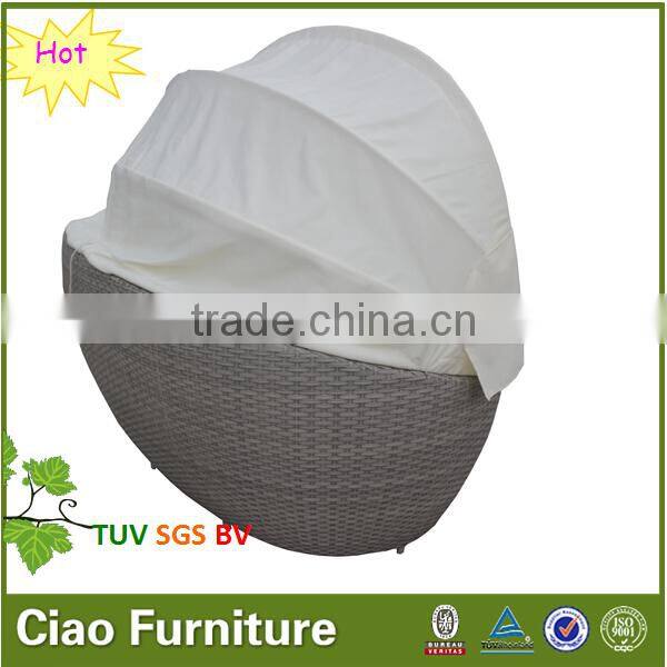 Round rattan outdoor pool bed with canopy