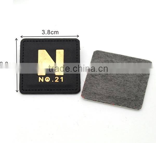White/black PU leather sew on patches with Gold metal plates fashion clothing label for jeans/jacket PLB-022