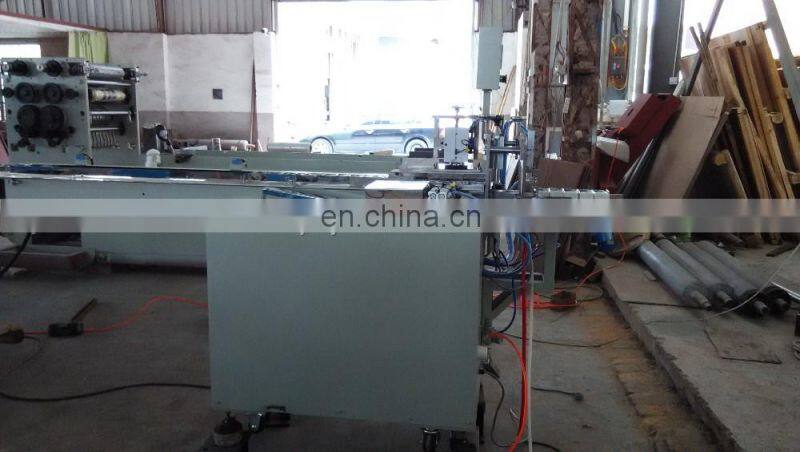 Semi automatic handkerchief paper tissue bags packaging machine