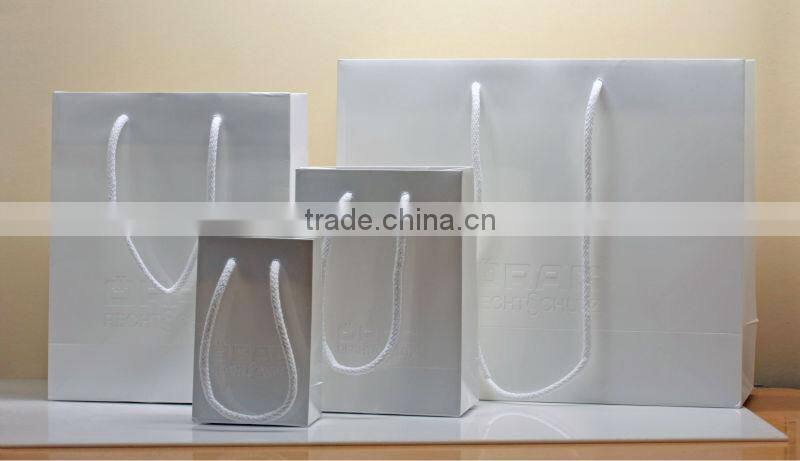 2014 Customized paper carrier bag with colorful ribbon ,beautifl and fashion ribbon paper bag free sample wholesale