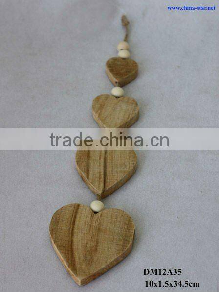 wood heart hangings with bird decor