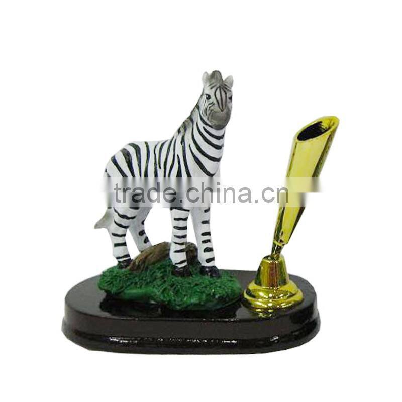 revolving pen holder with zebra figurine