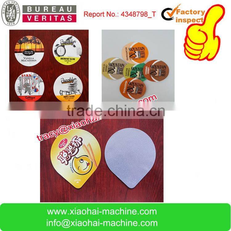 Aluminum foil lids punching and embossing machine for yogurt cups