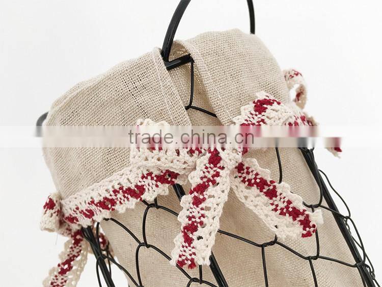 Small rustic tall wire basket with handle for storage