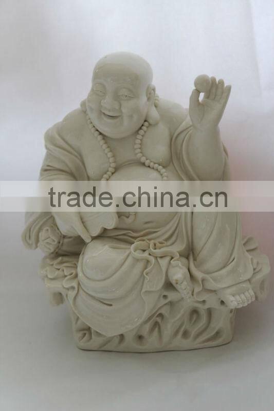 wood standing buddha