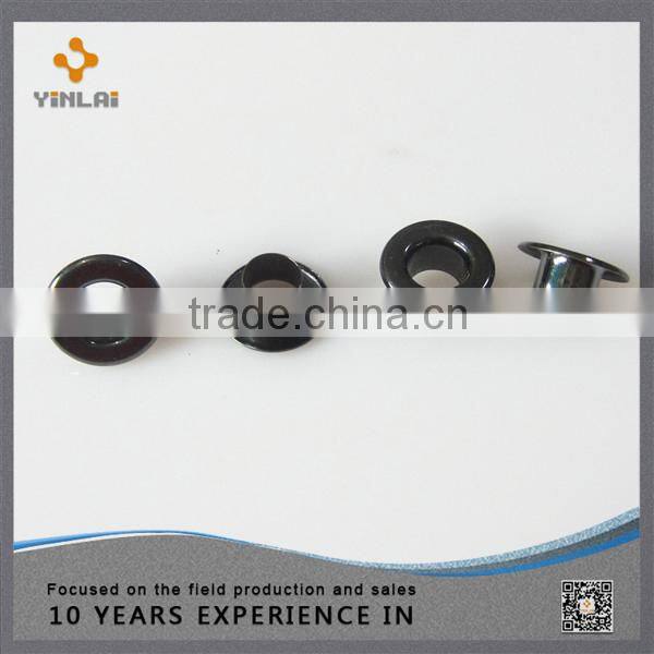 Decorative metal shoe eyelet