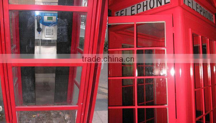 Antique red public telephone booth for sale