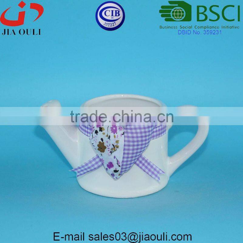 With black polka dots Ceramic cup with saucer for flowers