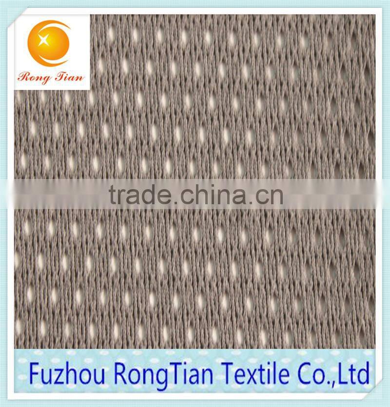 Factory sales grey polyester warp knitted low elastic hole lining mesh fabric