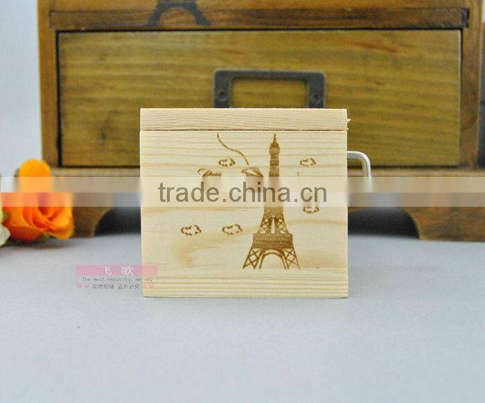 Natural wood color rotating music box