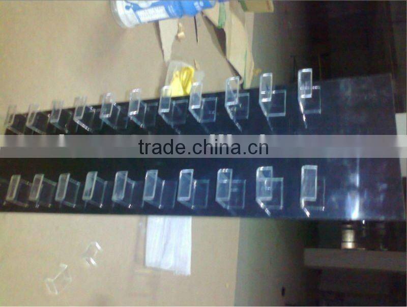 Organic glass display shelf for small adorn article