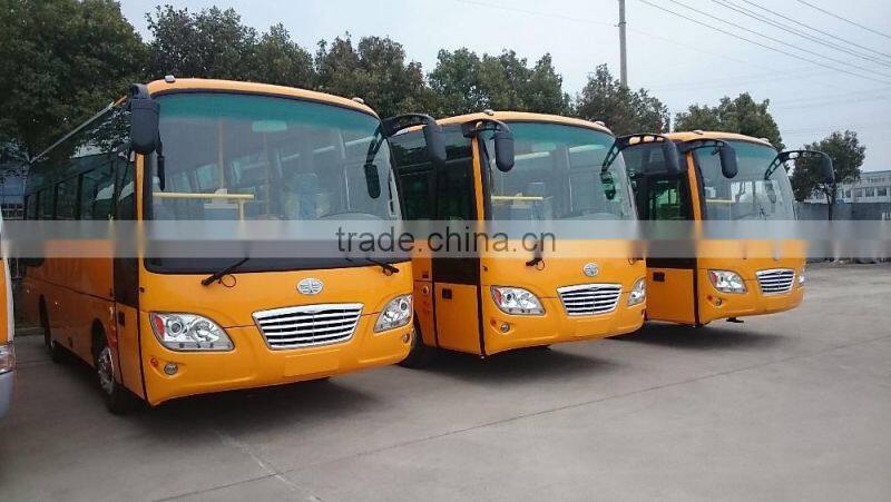 Huaxin brand 7.3m 31 seats Diesel LHD manual tranmission mini bus price