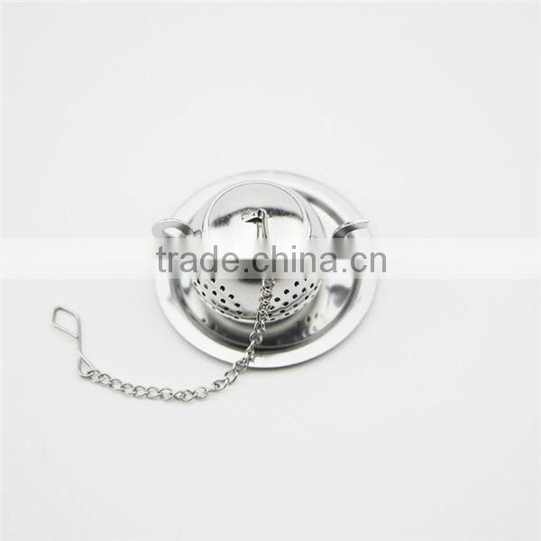 Small stainless steel teapot shaped strainer