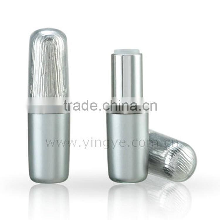 Red drop shape liquid cosmetic container with brush