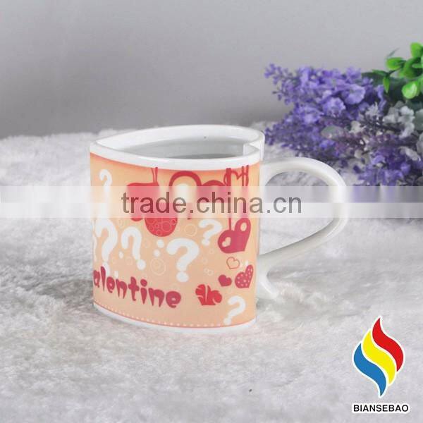 heart shape ceramic mug with revolving logo