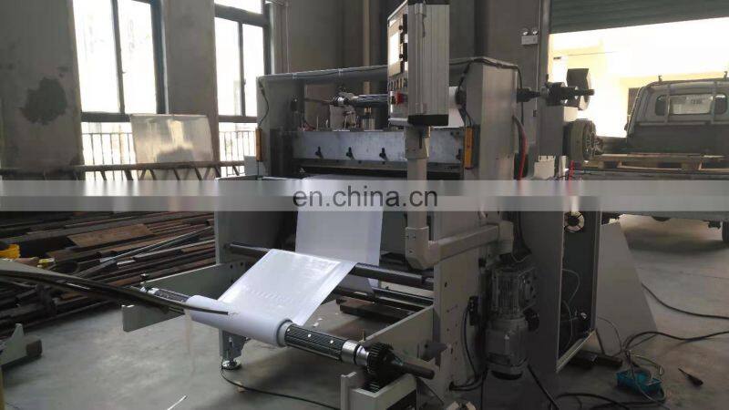 Roll to sheet cutting machine with kiss cutting