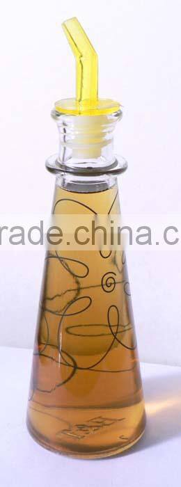 colored glass olive oil and vinegar bottle