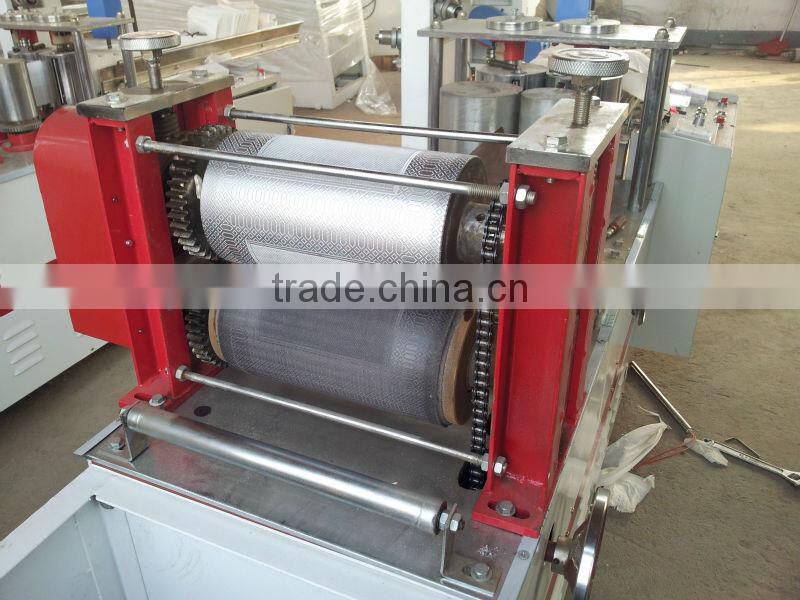 Paper napkin machine