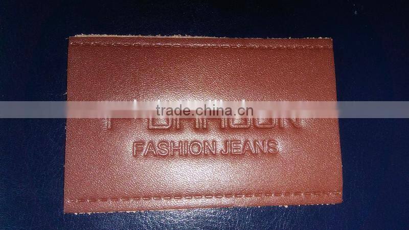 Wholesale embossed logo on PU leather patch for jeans and bags