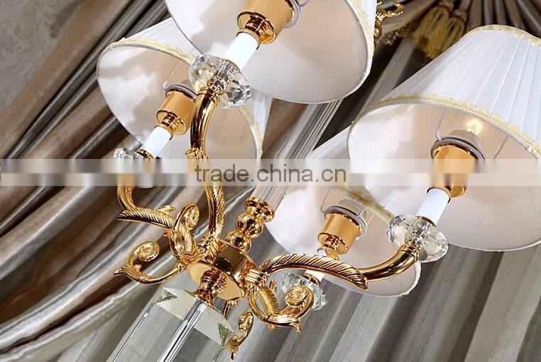 Four heads golden plated metal clear K9 crystal floor lamp with white color lampshade