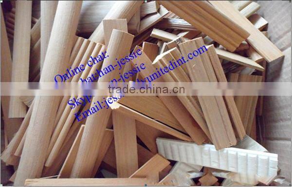 unpainted wood baseboard