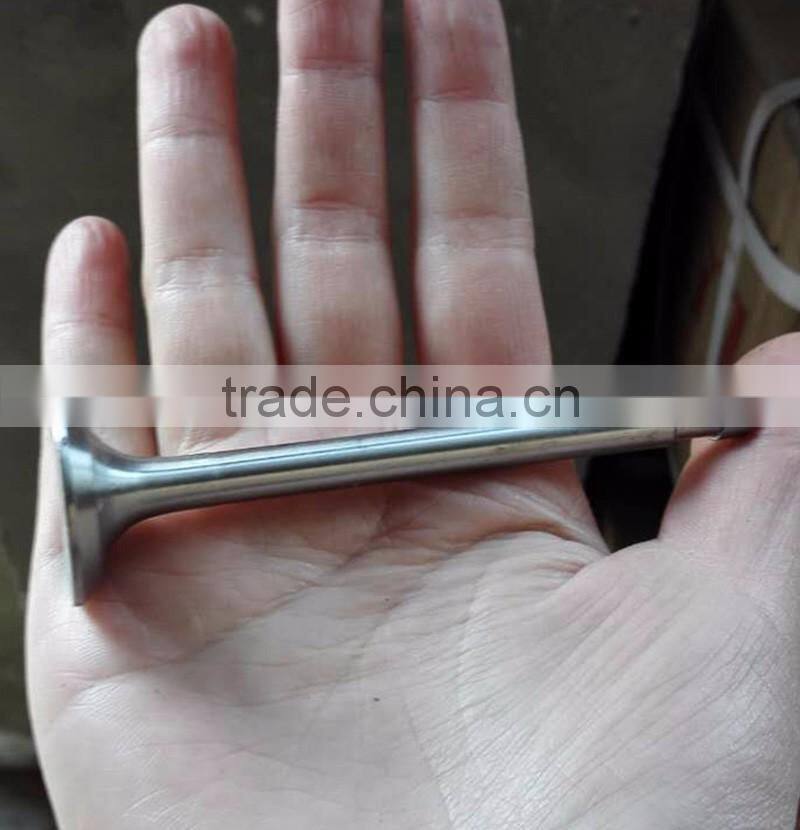 Intake and exhaust valves for single cylinder tractor engine