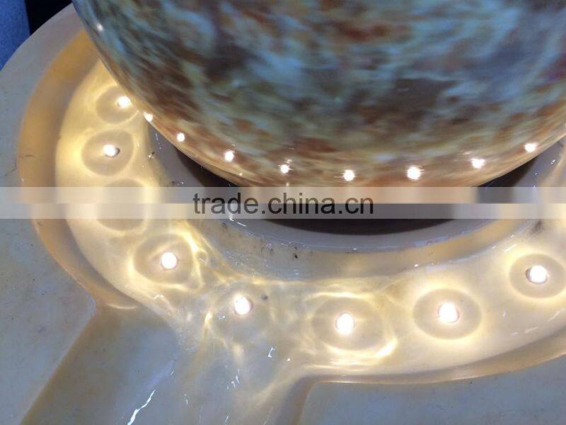 LED yellow light color resin and sandstone fountain with ball