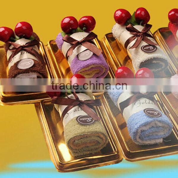 China OEM manufacture hot selling 100% cotton towel cake souvenir