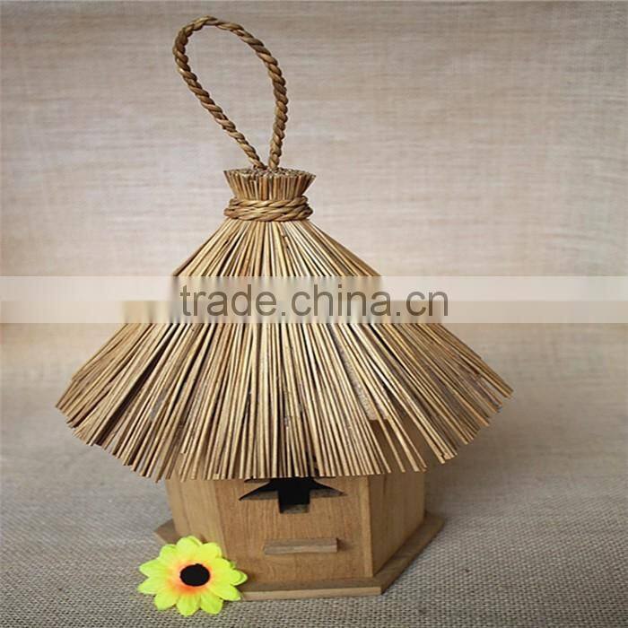 Wood carved bird christmas miniature houses with tree shaped window