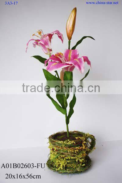 artificial lily with glass pot