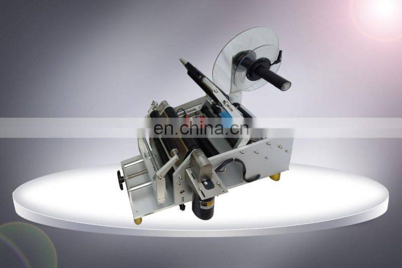 HIG Omron detect eye automatic round bottle sticker labeling machine with fix-point function