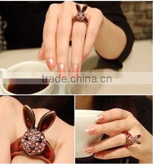 Young lady favourite diamante wine red smart rubbit rings