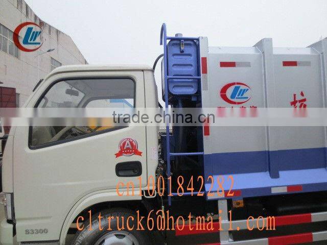 Dongfeng Small 4*2 Refuse Compactor with rear bucket