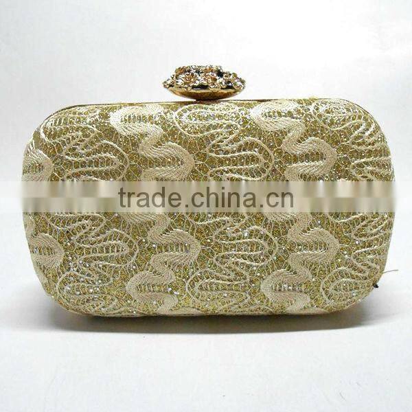 Matching metal frame clutch bag