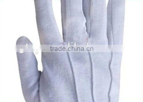 white cotton hand gloves