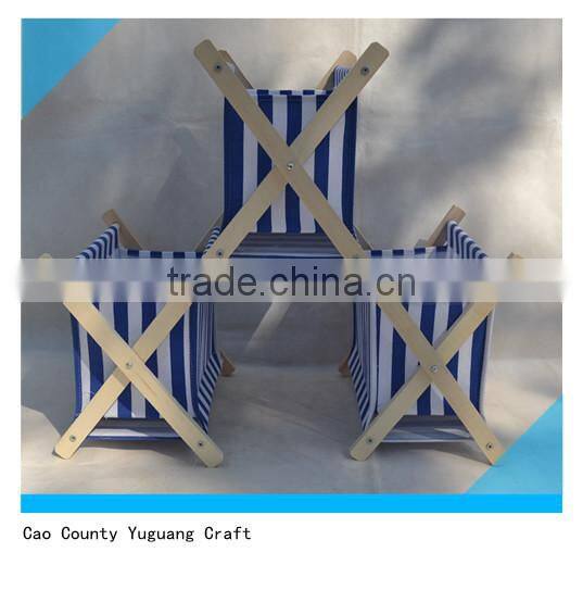 wooden magazine rack with cloth bags