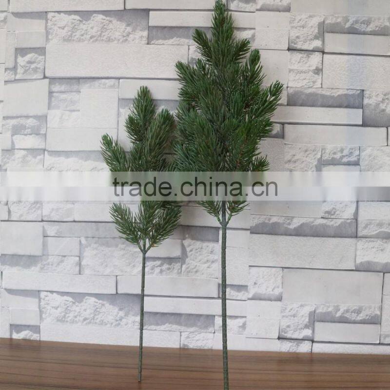 Plastic white pine tree branch flocked