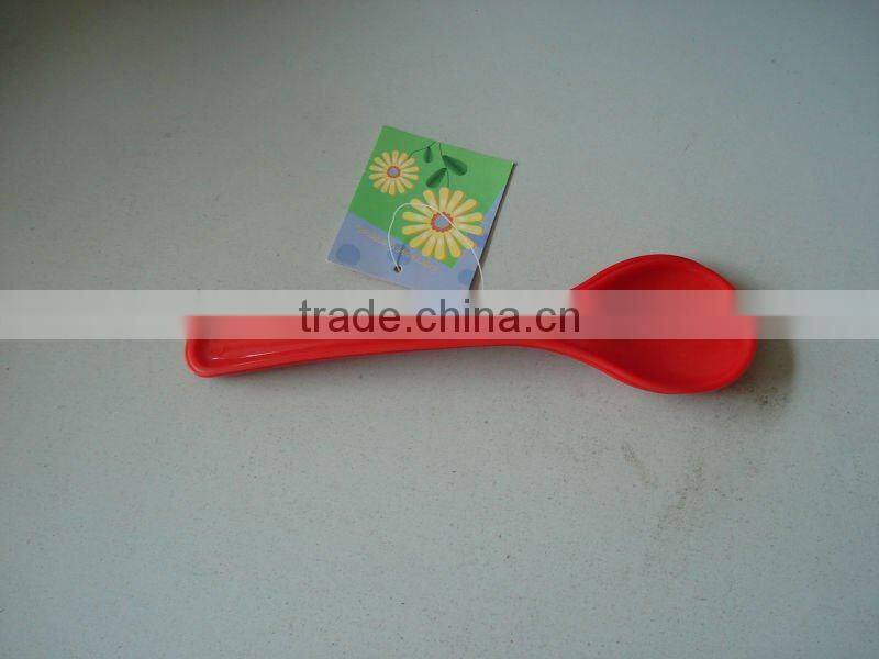 Plastic salad spoon and fork une cuillere