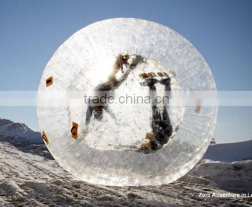 recreation and sport of rolling downhill inside an orb,transparent plastic zorb ball