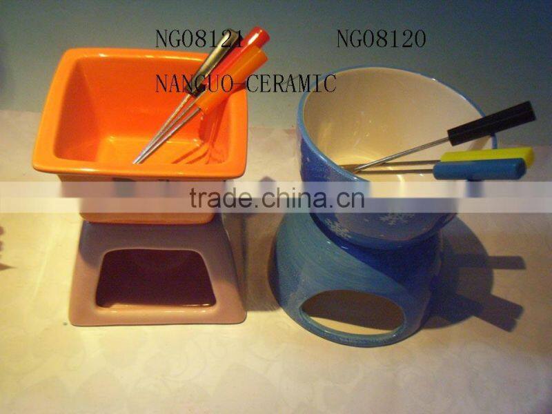 ceramic chocalate fondue pot with fork