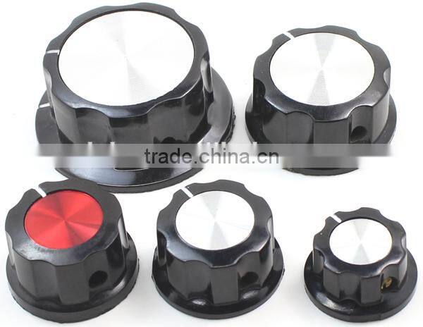 Large boss style fluted black turning knob with silver top