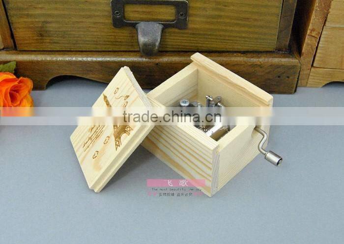 Natural wood color rotating music box