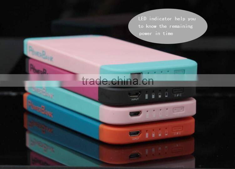 2014 High quality built in cable 5000mah silicon powerbank