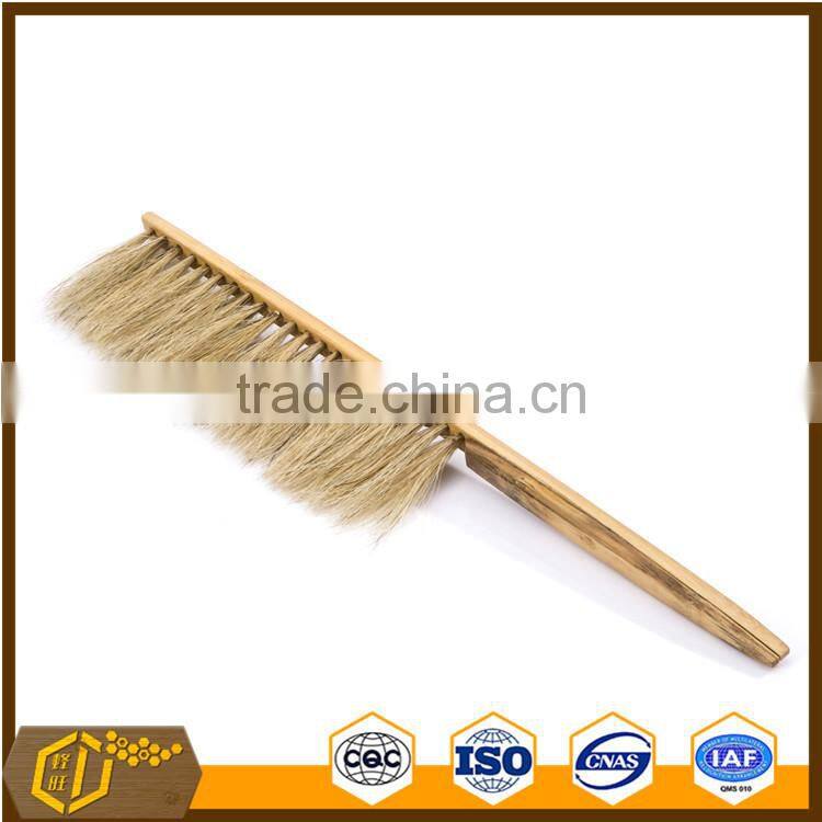 wooden hand beekeeping beehive frame cleaning