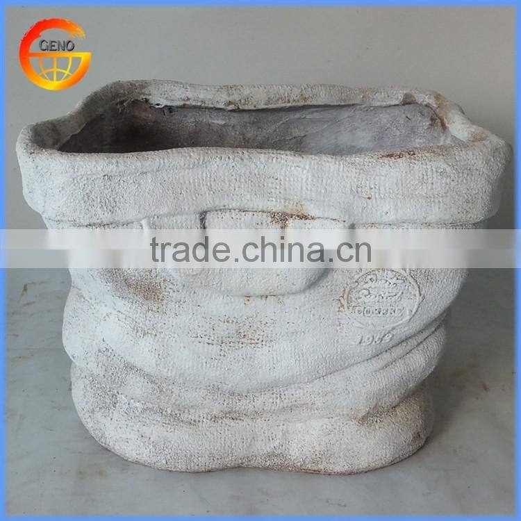 Fiber glass garden flower pot with rust metal effect