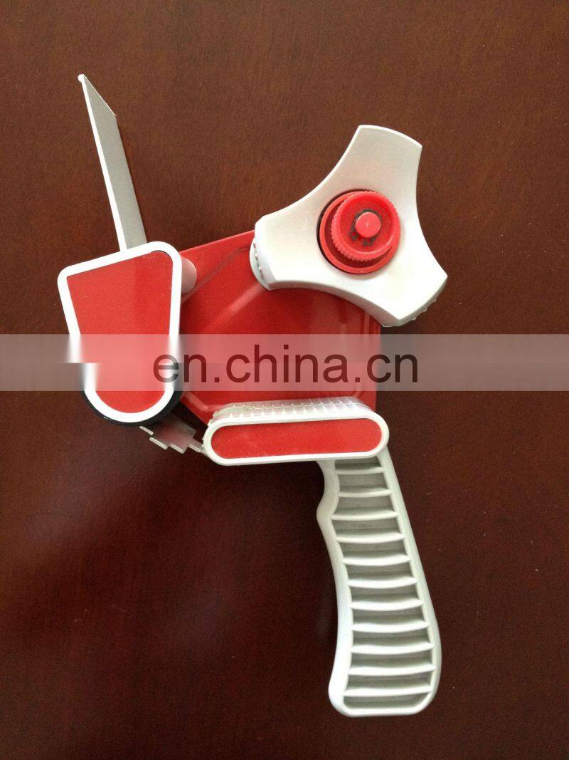 Handheld gun tape dispenser