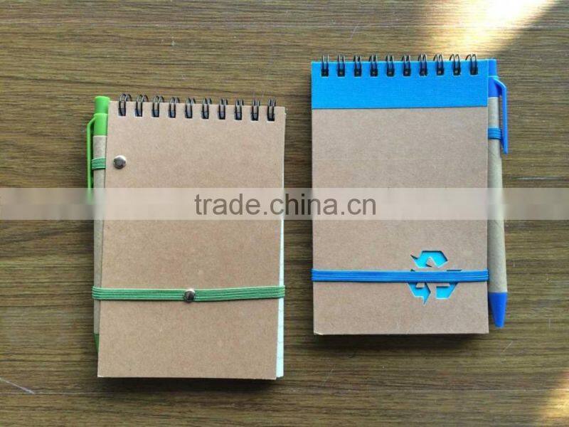 Promotion cheap and popular 140x90mm recycle notebook with pen attached