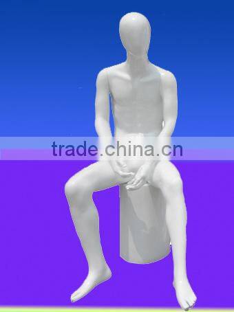 Hot sitting male mannequin