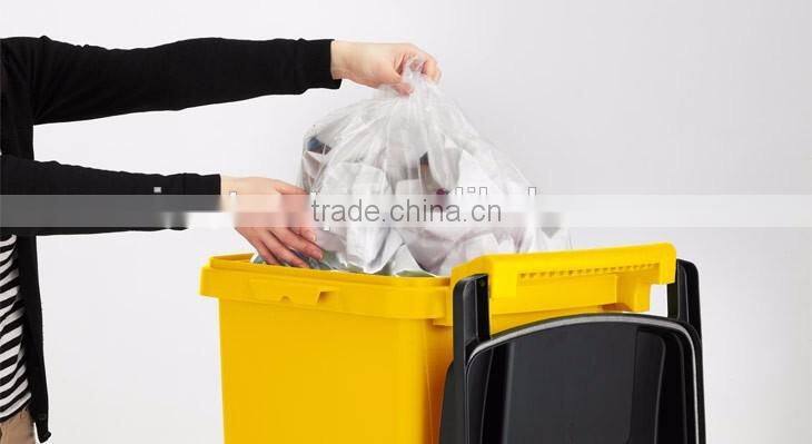 Various sizes of open top trash containers with casters and handle